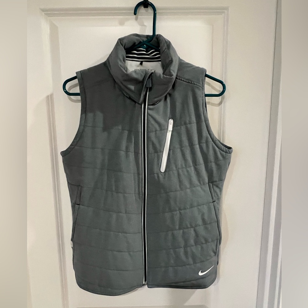 Nike women’s golf vest. Soft, warm, with hood.